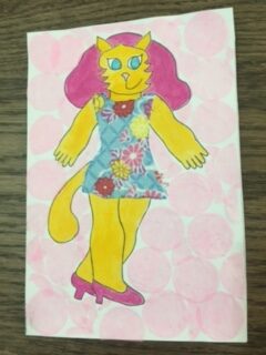 Cat-Woman wears flowered dress