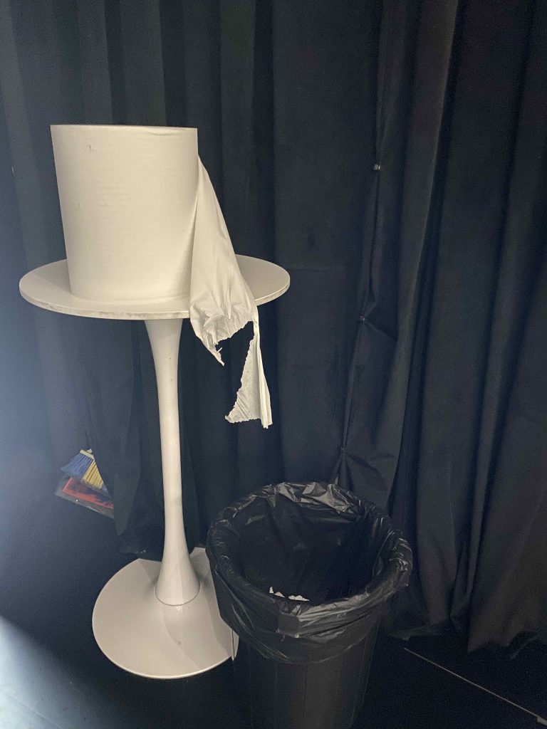 Visitors who touched ADA to make it move may get their hands stained by charcoal, so they're invited to help themselves to some toilet roll paper to wipe their charcoal stained fingers.