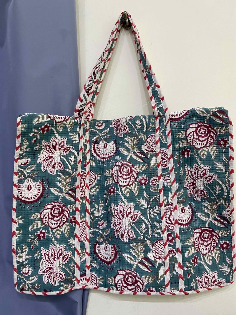 Environmentally-friendly re-usable fabric bag