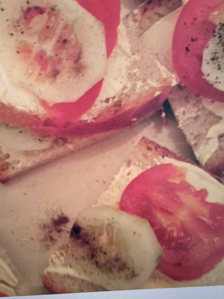Tomato Tiger (toasted English muffin topped with cheese slice and tomato slice and curry powder)