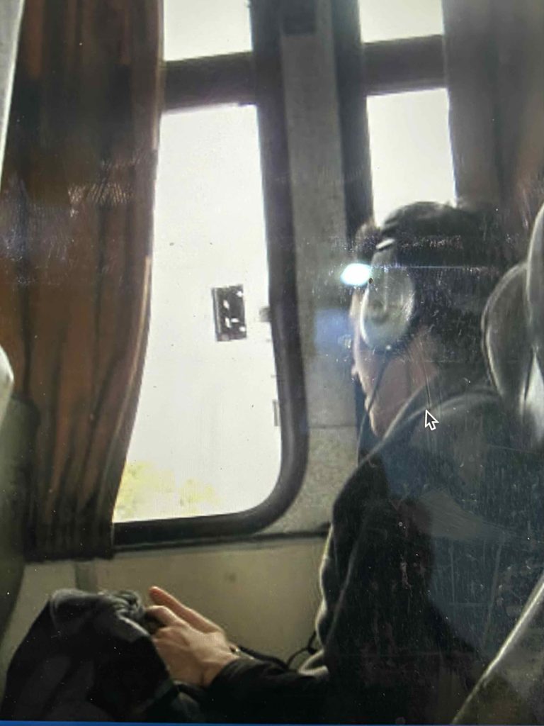Man wears headphone on his head.