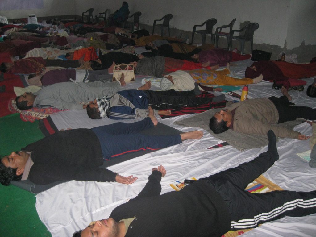 Men lie down to rest or do yoga