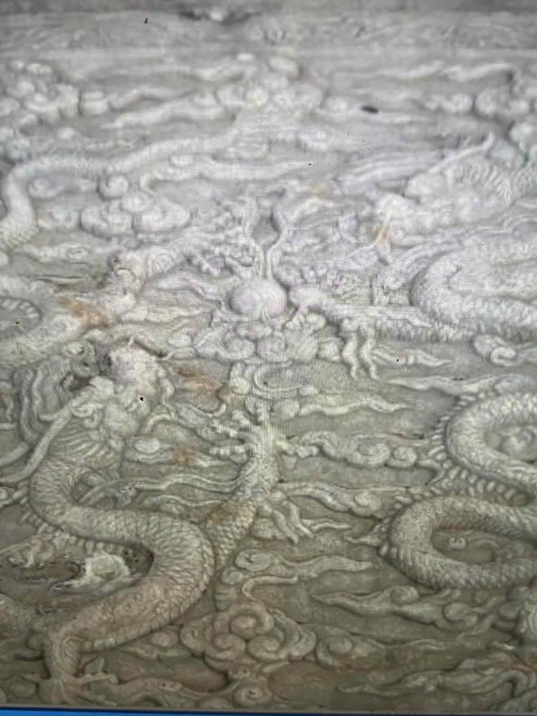 Clouds swirl around dragons