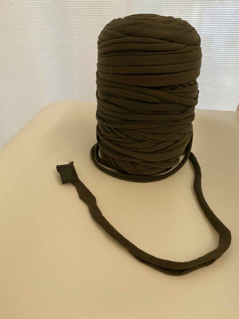 Fabric that's cut into narrow strips to invent a "yarn" for use, in knitting or crochet.