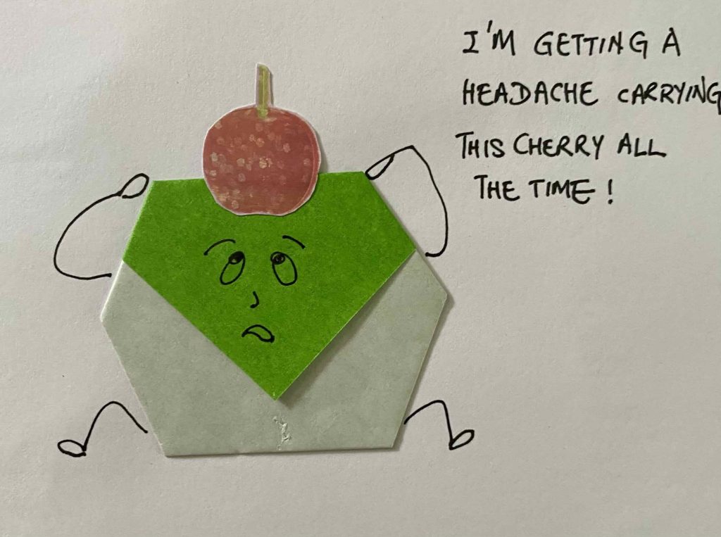 A cupcake complains about it's crowning glory.