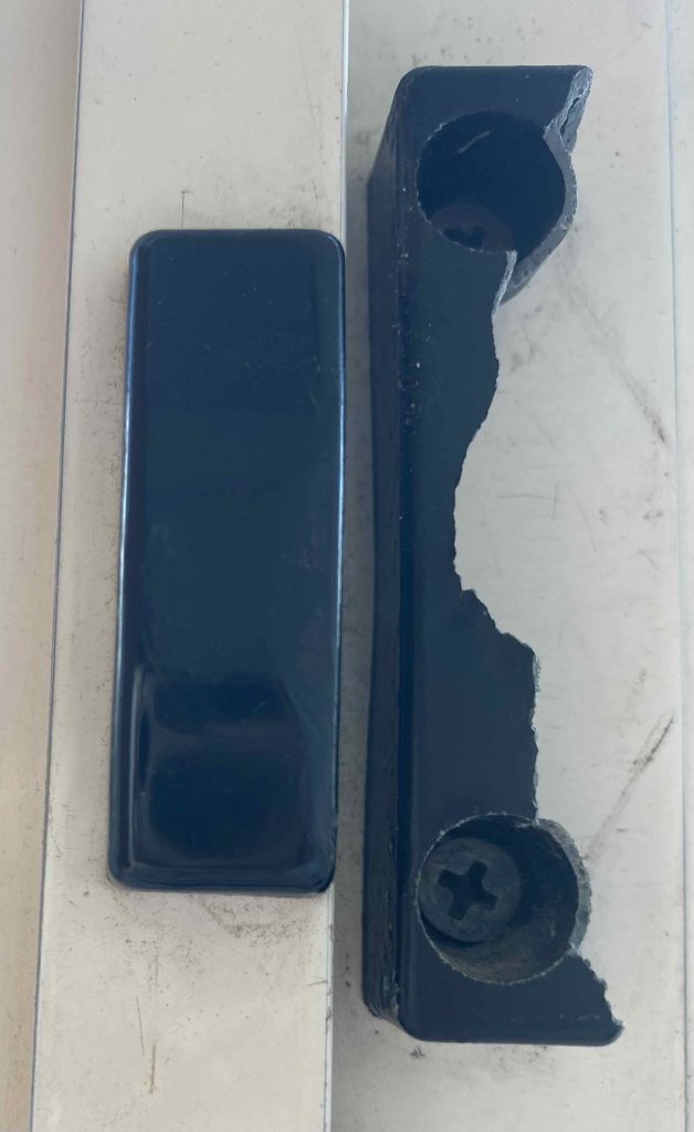 Window handle wrenched off.