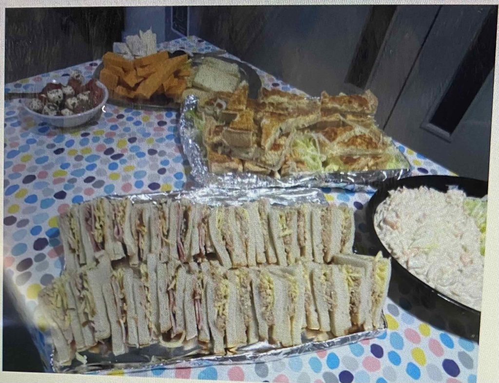 Mini sandwiches, quiche, fresh salad sticks.