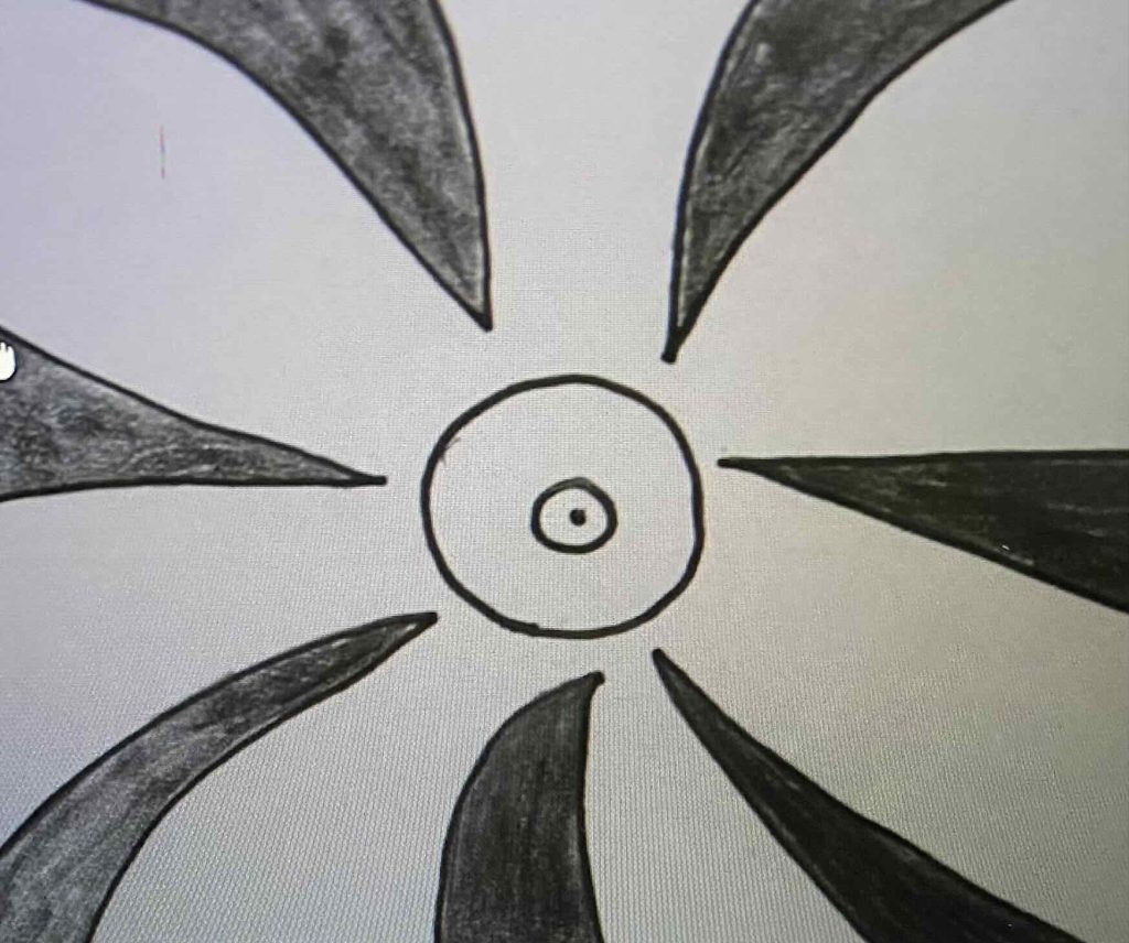 Somebody or some phenomenon drew a sun with emitting rays.