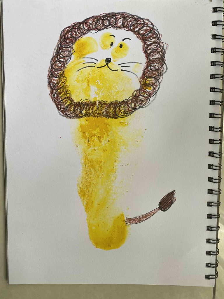 broken foot stamp print drawn as a big cat (lion)