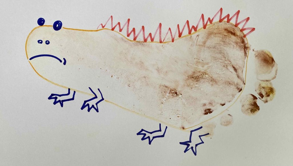broken foot stamp print drawn as lizard