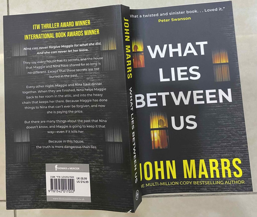 What Lies Between Us by John Marrs.