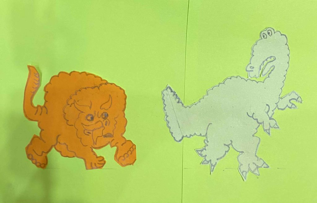 Triceratops chases a T. Rex.